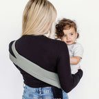 Close-up of the Olive Rouu Baby II hip carrier fabric and seat